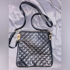 Black cross body purse it don’t have a brand tag on it
